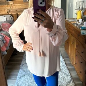 Sophisticated Pink Women's Top with black piping.